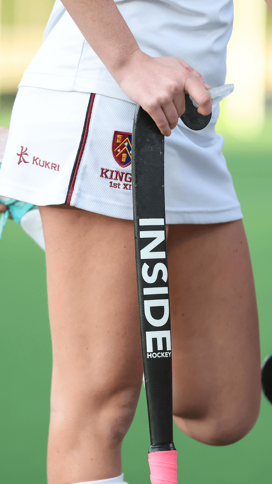 An Inside Hockey Shadow stick held by a hockey player.